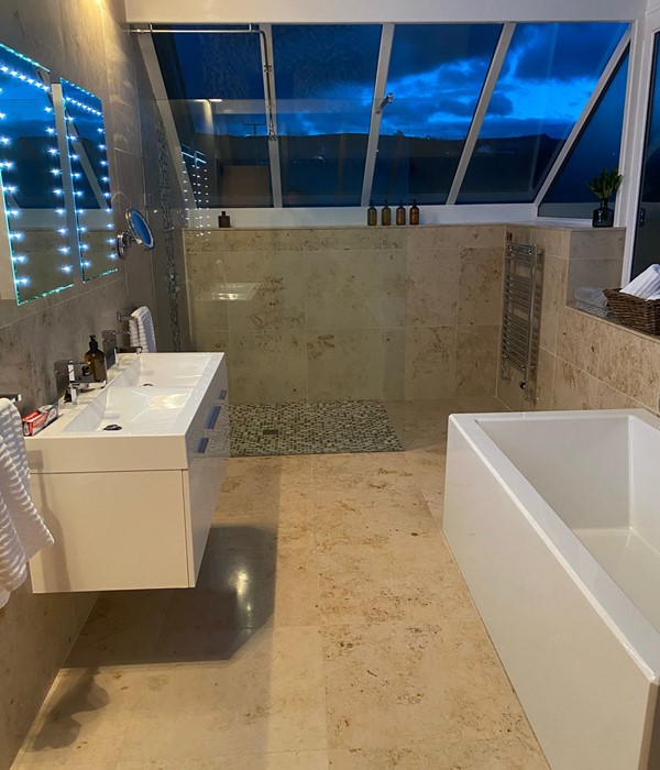 Completed bathroom renovation with expert tiling by Celtic Plumbing & Tiling, Pembrokeshire
